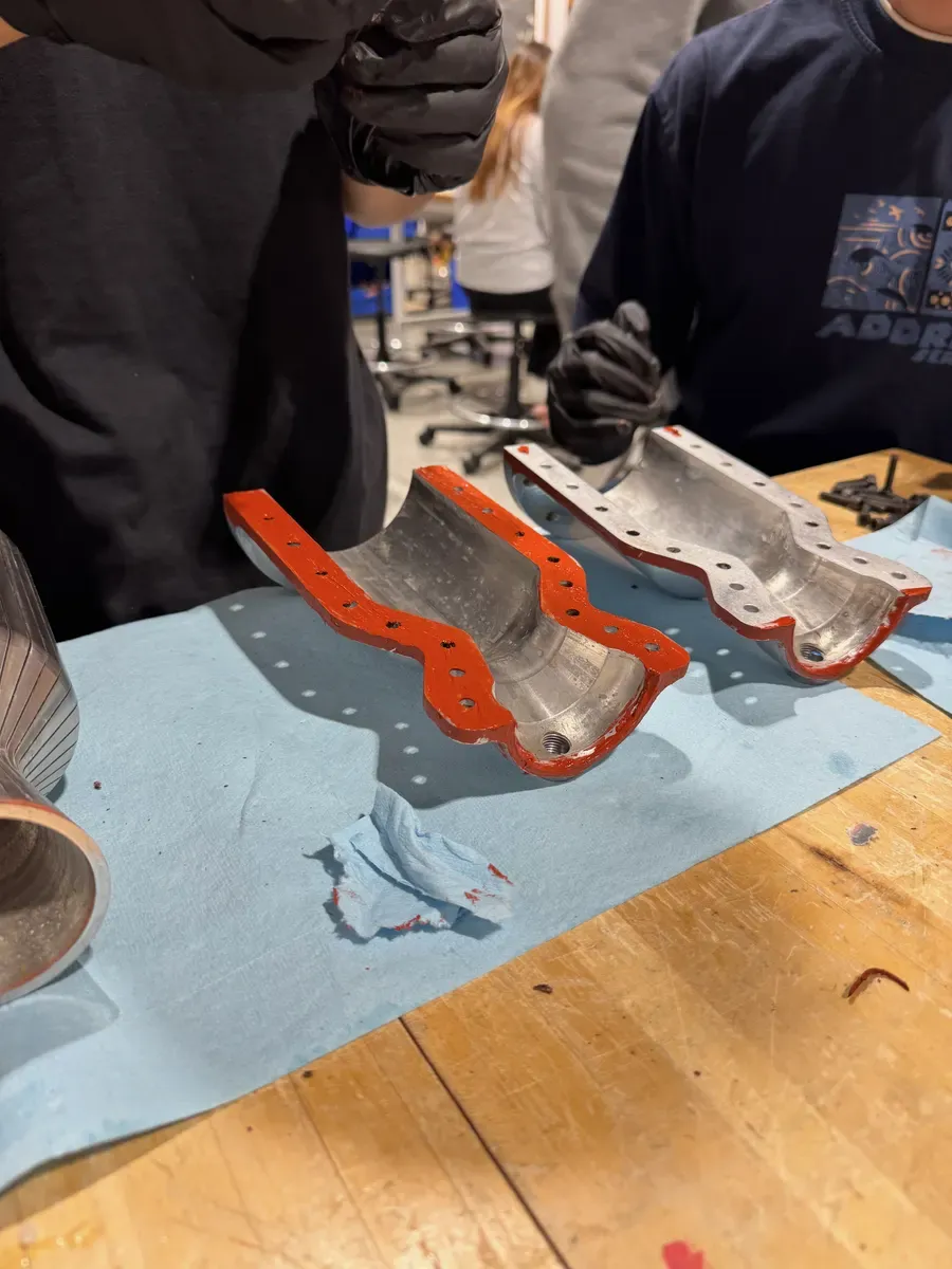 The two clamshell halves opened and laid side by side.