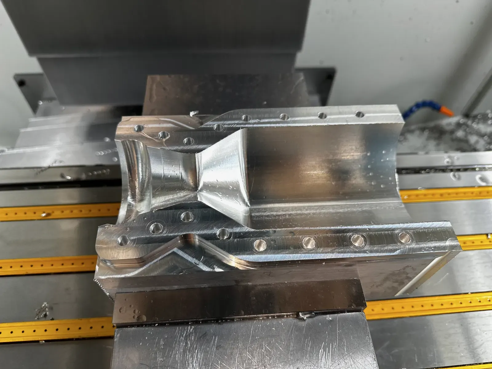 Close-up of the machined internal contour of a clamshell engine half.